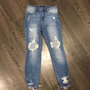 Medium wash, faded, ripped skinny jeans